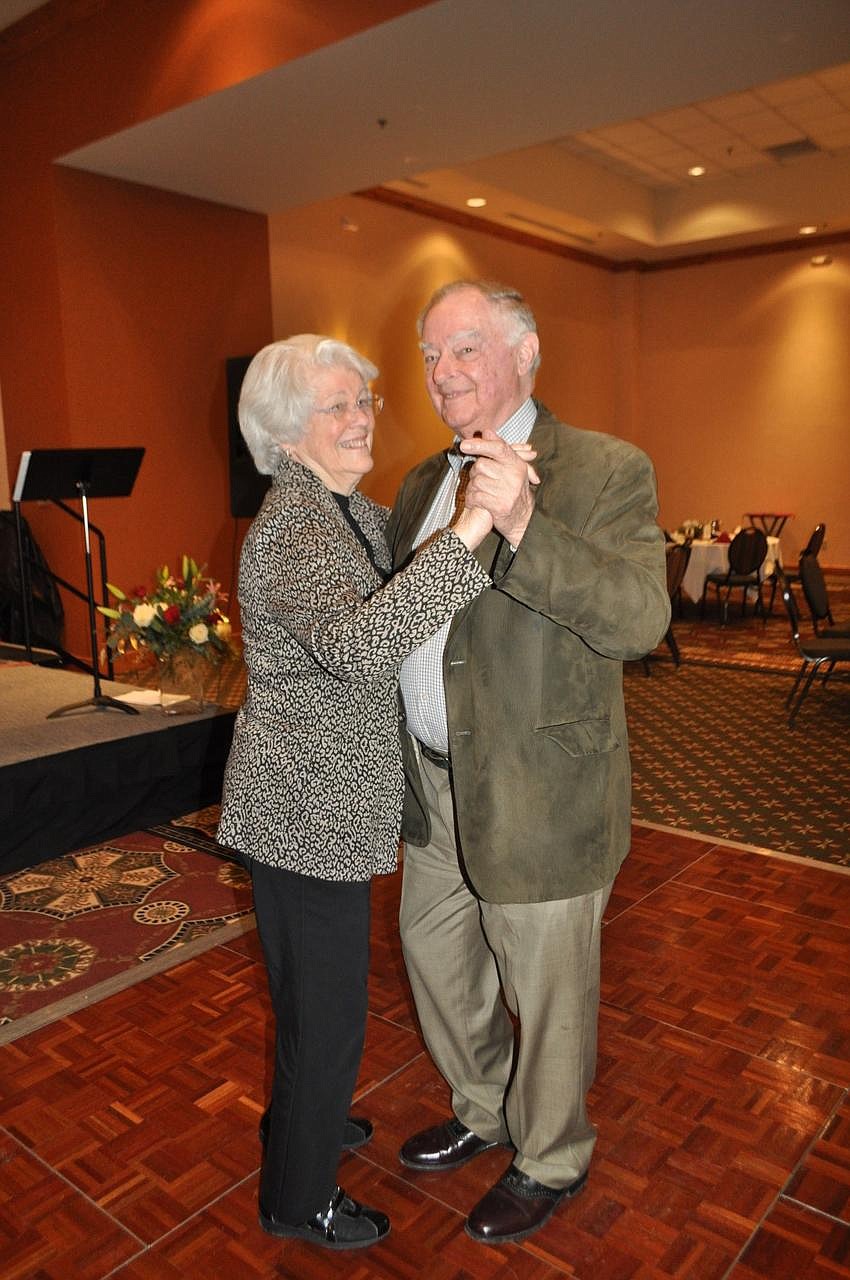 Ray and Ladeine Thompson participate in a "dance-off" at the Flathead County Republican Women Chocolate Extravaganza. (Photo provided)