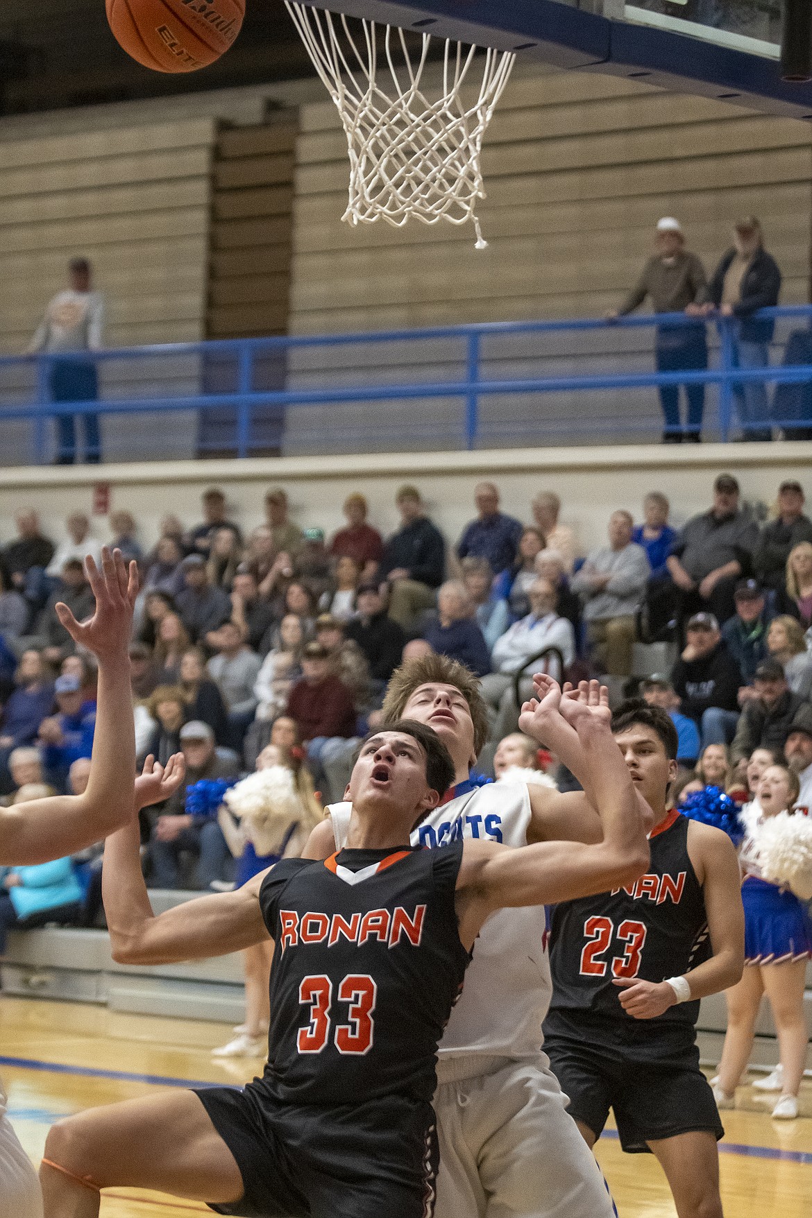 Ruben Couture maneuvers for a rebound during Ronan's district play-in game at Columbia Falls. (Chris Peterson/Hungry Horse News)