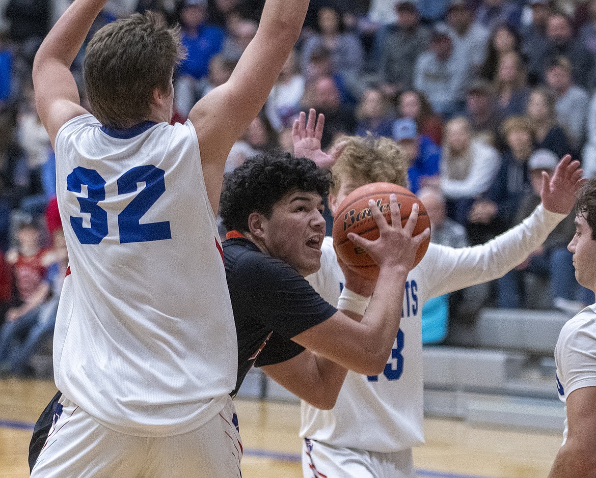 Ronan's Marlo Tonasket Jr. looks for a shot during the Chiefs' district play-in game at Columbia Falls. (Chris Peterson/Hungry Horse News)