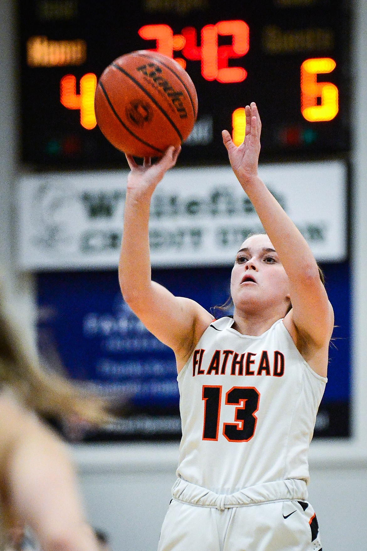 Flathead's Avery Chouinard (13) looks to shoot against Missoula Hellgate at Flathead High School on Thursday, Feb. 24. (Casey Kreider/Daily Inter Lake)