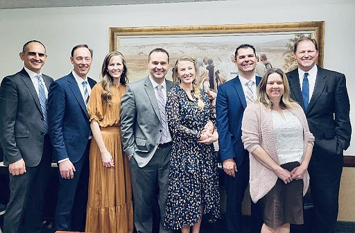 The new leaders of the Post Falls Stake with their wives and two visiting authorities. From left: Elder Seigfried A. Naumann, Travis Roth, Kim Roth, Bradley S. Moss, Sharee Moss, Timothy Bastedo, Sara Bastedo and Elder Mark A. Bragg.