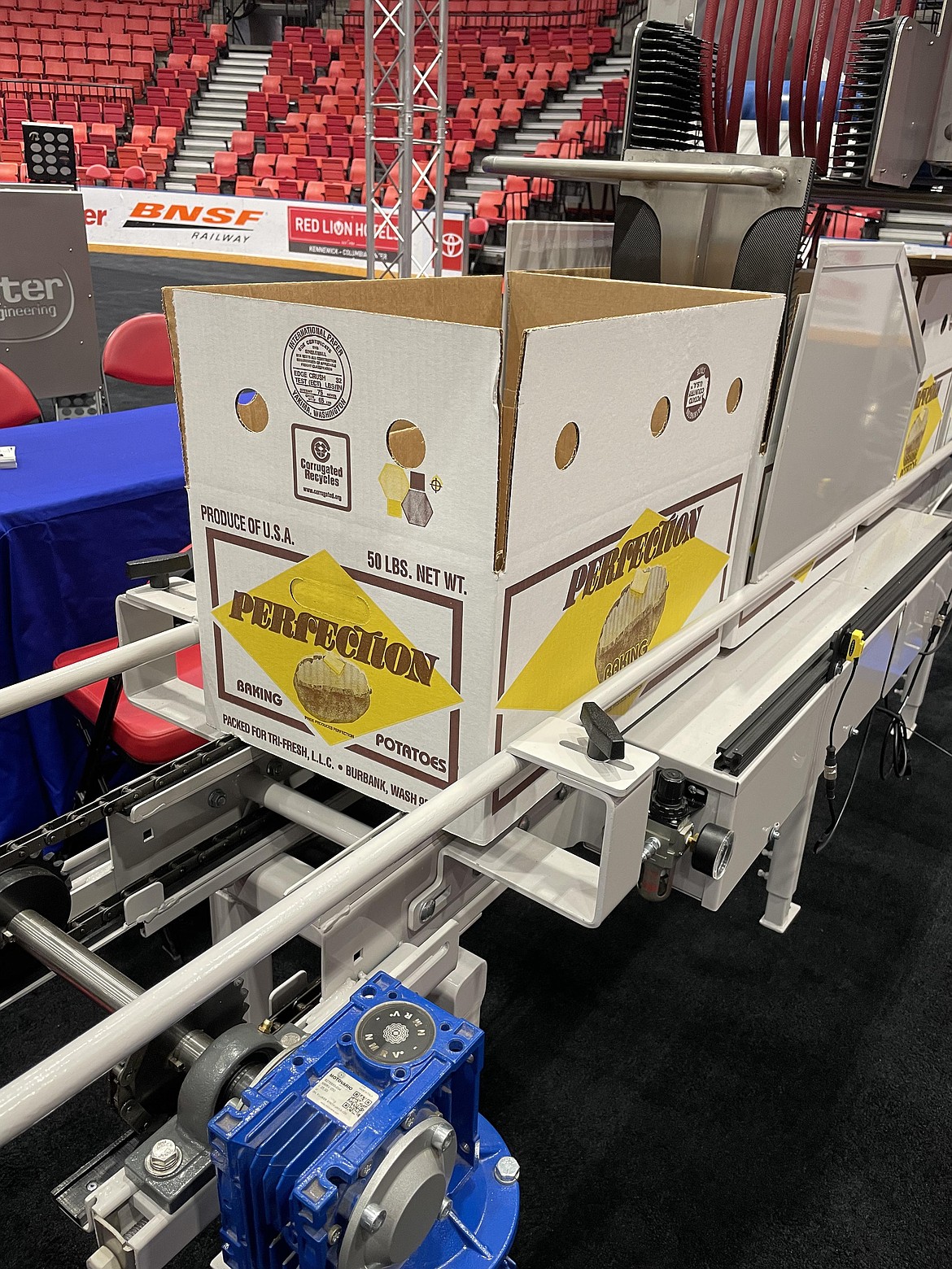 An empty box sits atop an Exeter Engineering potato packaging machine at the Washington Oregon Potato Conference in Kennewick in late January.