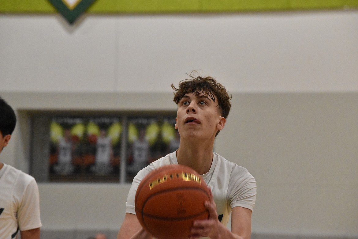 Quincy High School senior TreyVaughn Bierlink shoots a free throw during a matchup against Chelan High School on Jan. 25. The senior has a total of 555 points this season alone.