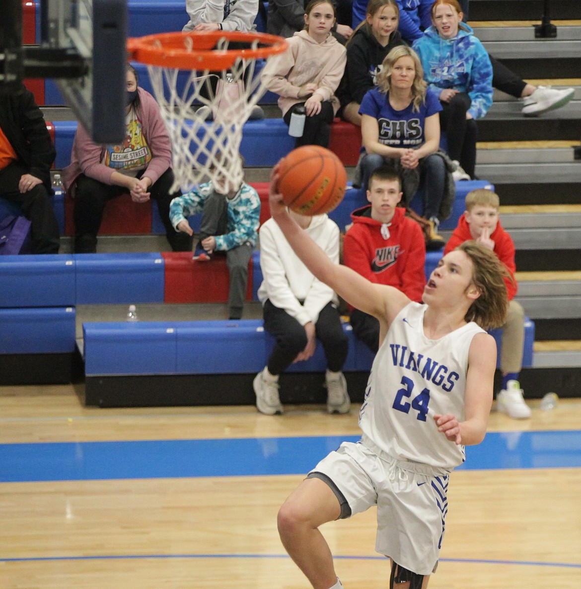 MARK NELKE/Press
Logan Orchard of Coeur d'Alene soars in for a first-half layup vs. Lewiston in the 5A Region 1 boys basketball second-place game Thursday at Viking Court.