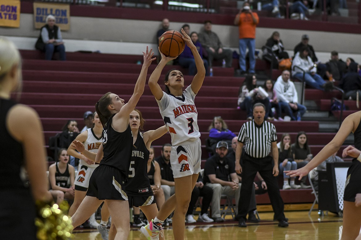 Liena Ulutoa takes a shot at the basket. The Maidens ended their season when they lost to Stevensville on Friday in Hamilton. (JP Edge photo)