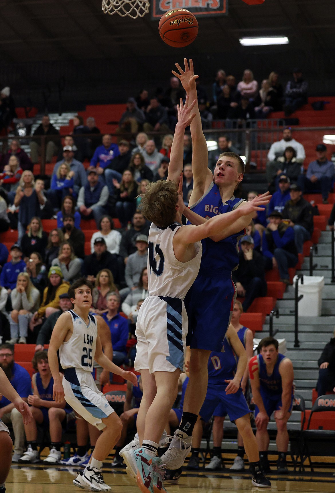 Bigfork’s Cole Knopik takes a shot from the baseline in the Vikings win over Loyola in the Western B Divisional semifinals Friday in Ronan. (Jeremy Weber/Daily Inter Lake)