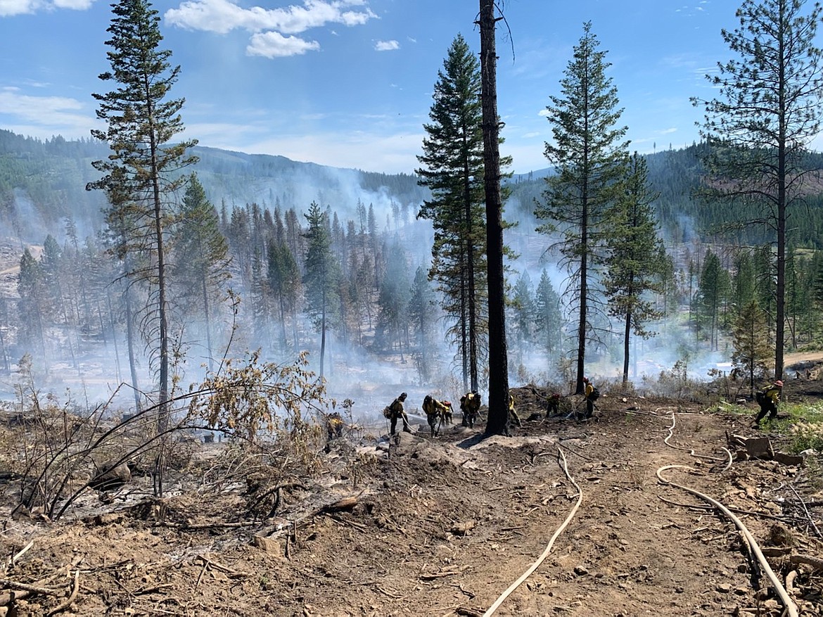 This photo shows wildland firefighters working on Little Pine Fire near Priest River last summer. A bill to give Idaho wildland firefighters hazard pay is going to the Idaho Senate for consideration after approval by the Idaho House of Representatives. Photo courtesy of the Idaho Department of Lands