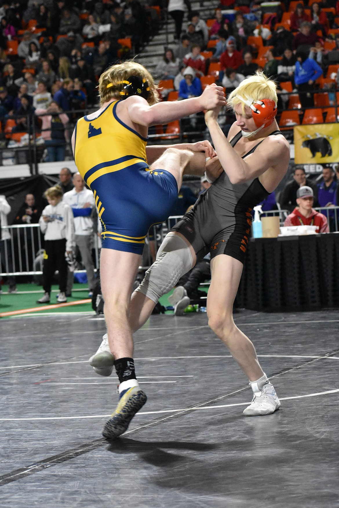 Photo by MOLLY MASON
Trey Smith, right, of Post Falls, beat Zac Kimes of Meridian 1-0 in the quarterfinals at 126 pounds Friday to advance to today's 5A semifinals at the state wrestling tournaments at Holt Arena in Pocatello.