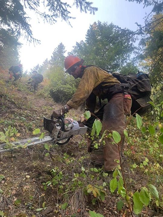 A firefighter works on the Pioneer Fire in Priest River in July. A bill approved by the Idaho House of Representatives on Friday would offer hazard pay to Idaho wildland firefighters if the legislation becomes law. Photo courtesy of the Idaho Department of Lands