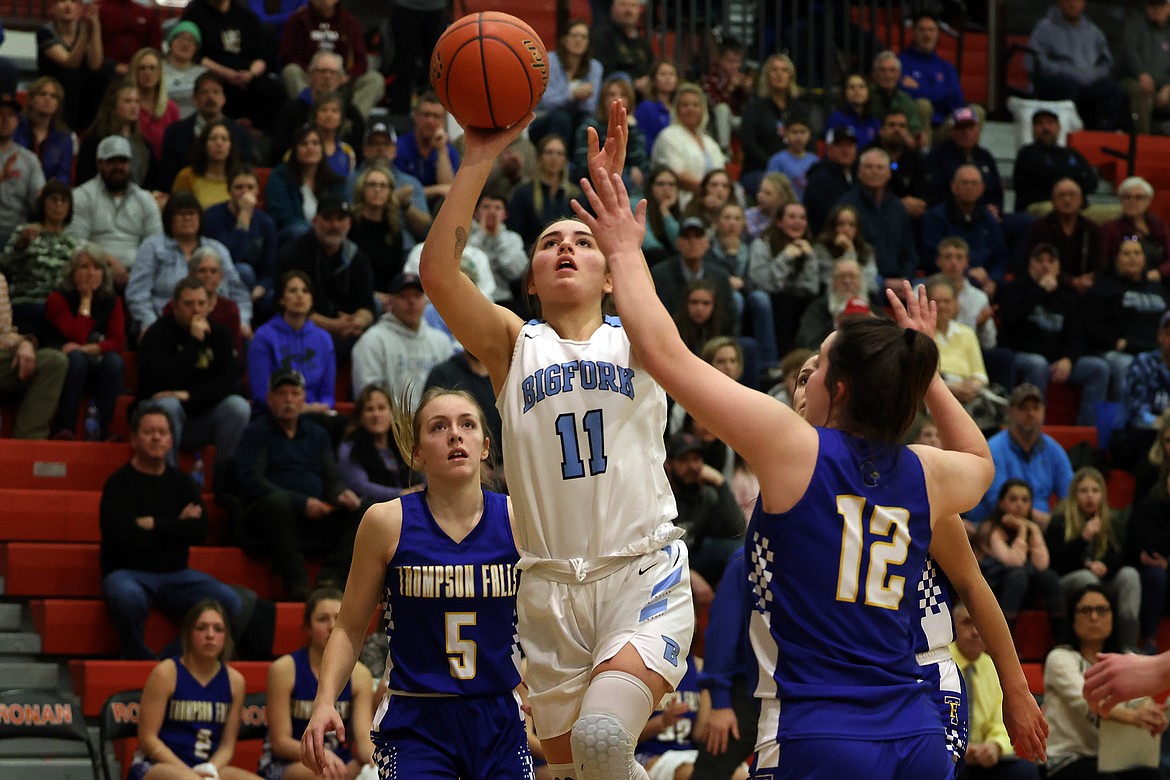 Bigfork's Emma Berreth pulls up for a shot against Thompson Falls during the Western B Divisional title game in Ronan Saturday. (Jeremy Weber/Daily Inter Lake)