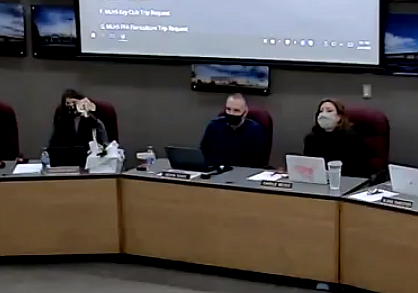 Moses Lake School Board President Kevin Fuhr (center) asks protesters to leave the board meeting on Thursday, Feb. 24. Fuhr said he supported the right to protest peacefully, but mandates from Olympia needed to be complied with to serve the best interests of the district. He said he has seen the impact refusing to comply with the mandates has had on other districts. Fuhr is flanked by board vice president Shannon Hintz (left) and Interim Superintendent Carole Meyer.