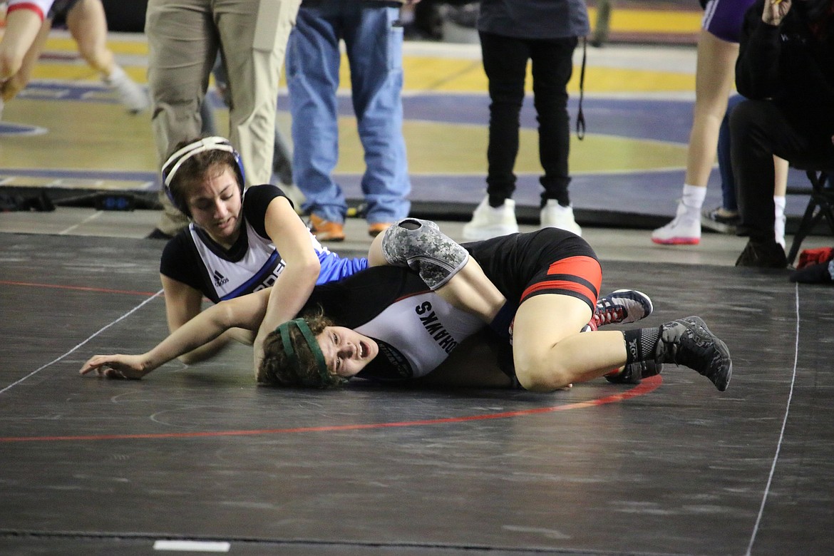 Warden High School sophomore Jada Hernandez grapples with her opponent during the Washington Interscholastic Activities Association Mat Classic XXXIII state tournament at the Tacoma Dome Feb. 18-19.