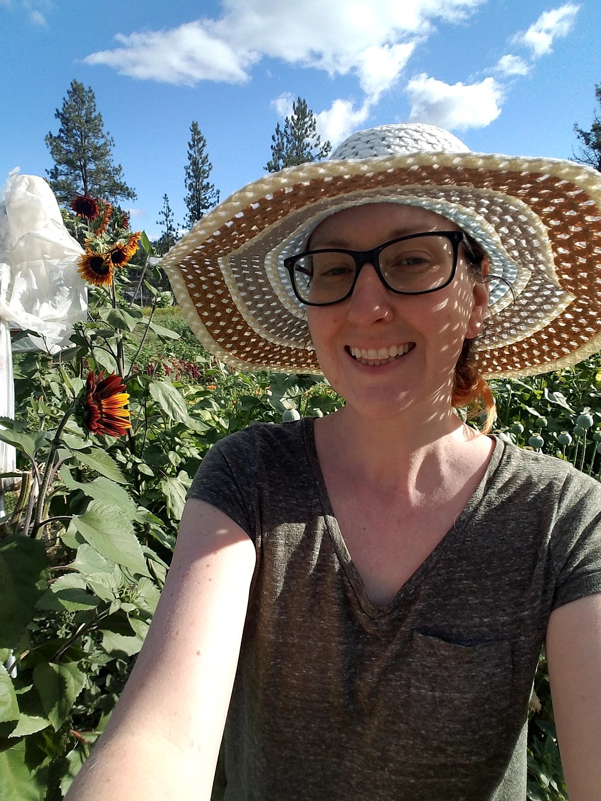 Eryn Kelly, the. creator of The Lady Eclectic is all smiles amongst the flowers at Crescent Ridge Farm in Alberton.(Photo courtesy Eryn Kelly)