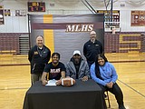 Two MLHS athletes sign to colleges