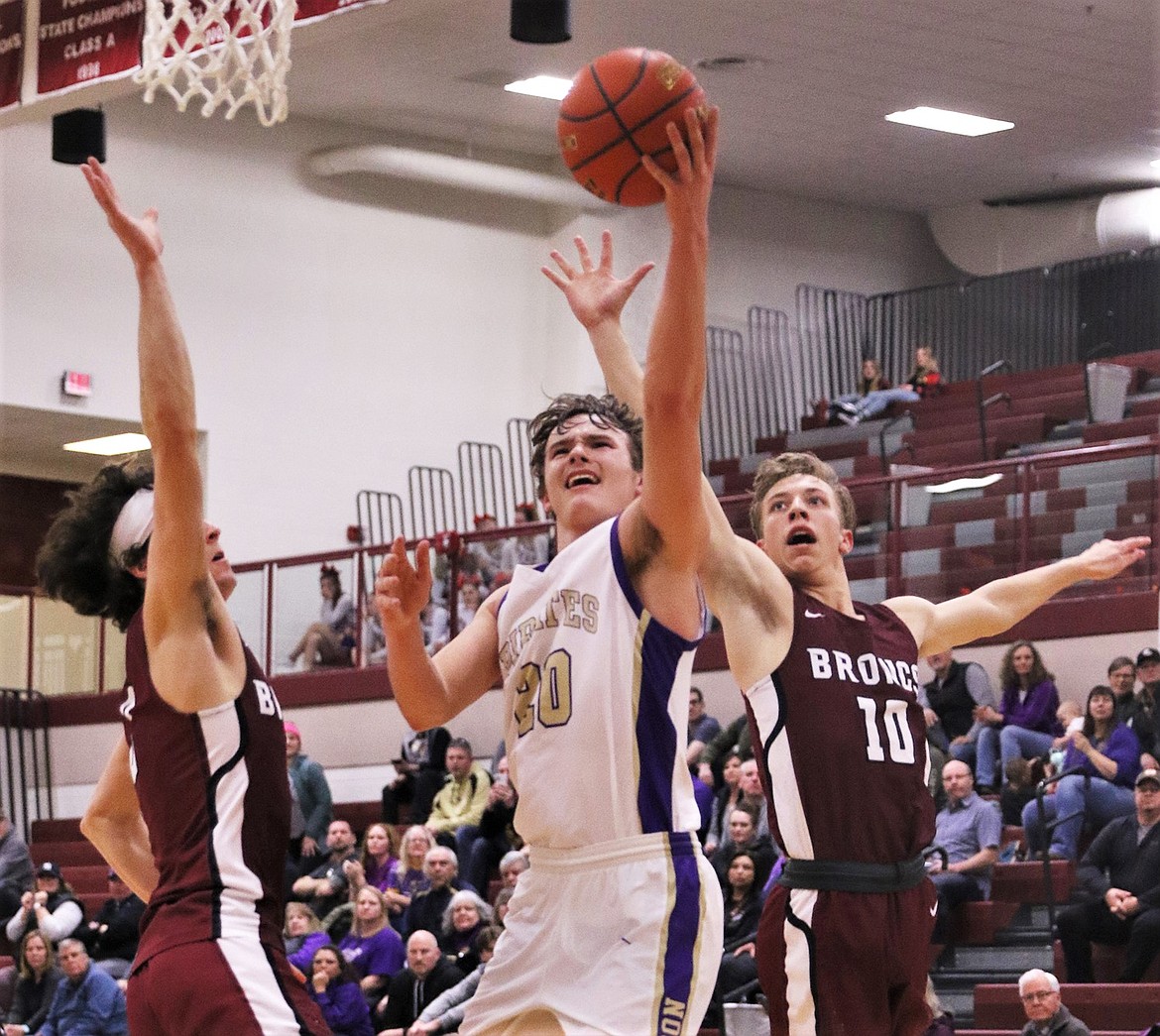 Jarrett Wilson splits the defense against Hamilton on Saturday. (Courtesy of Bob Gunderson)