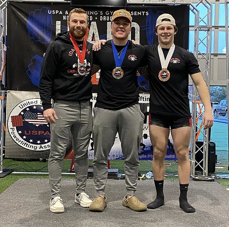 Levi Balison (right), poses after shattering three state records following the Idaho State Championships powerlifting event at the Rock and Armor Gym in Meridian.
This served as Balison’s first ever powerlifting event.