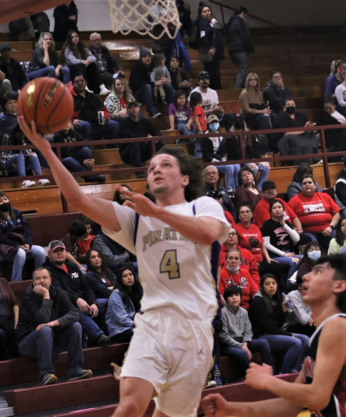 Xavier Fisher goes for the easy two points Saturday against Browning. (Courtesy of Bob Gunderson)