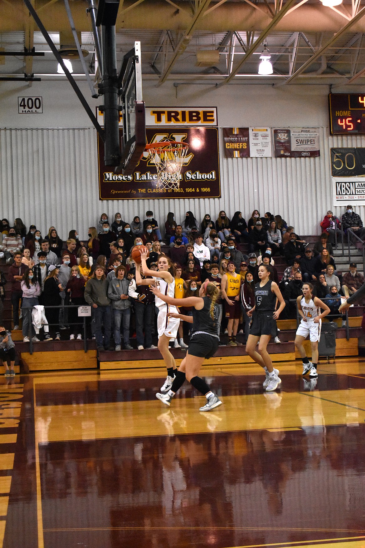 Moses Lake High School junior Sydney Macdonald (1) has possession of the ball as she decides whether to pass the ball or attempt a shot on Dec. 3  during the non-league matchup against Chiawana High School.