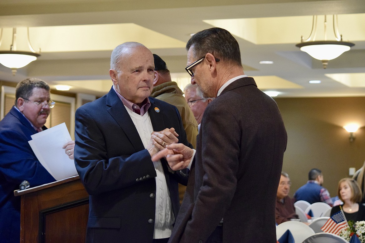 Moses Lake City Council Member David Eck (left) talks with physician and former Moses Lake Council member David Curnel (right) at the Grant County Republican Party Fundraiser and Lincoln Day Dinner last Saturday at the Pillar Rock Grill in Moses Lake. The dinner is the county party organization’s major fundraiser for the year.