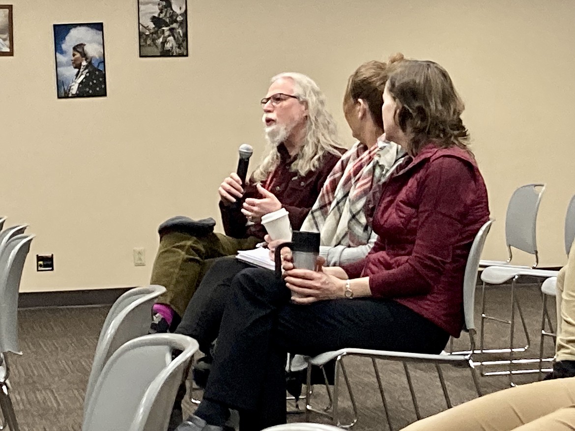 On left, North Idaho College theater professor Joe Jacoby speaks at the open forum at NIC's main campus on Tuesday. The Pauly Group, the search firm working with the NIC board of trustees to find the next president, is hosting two more open forums today Edminister Student Union Building in the Driftwood Bay room in the from noon to 1 p.m. and 6 to 7 p.m. HANNAH NEFF/Press