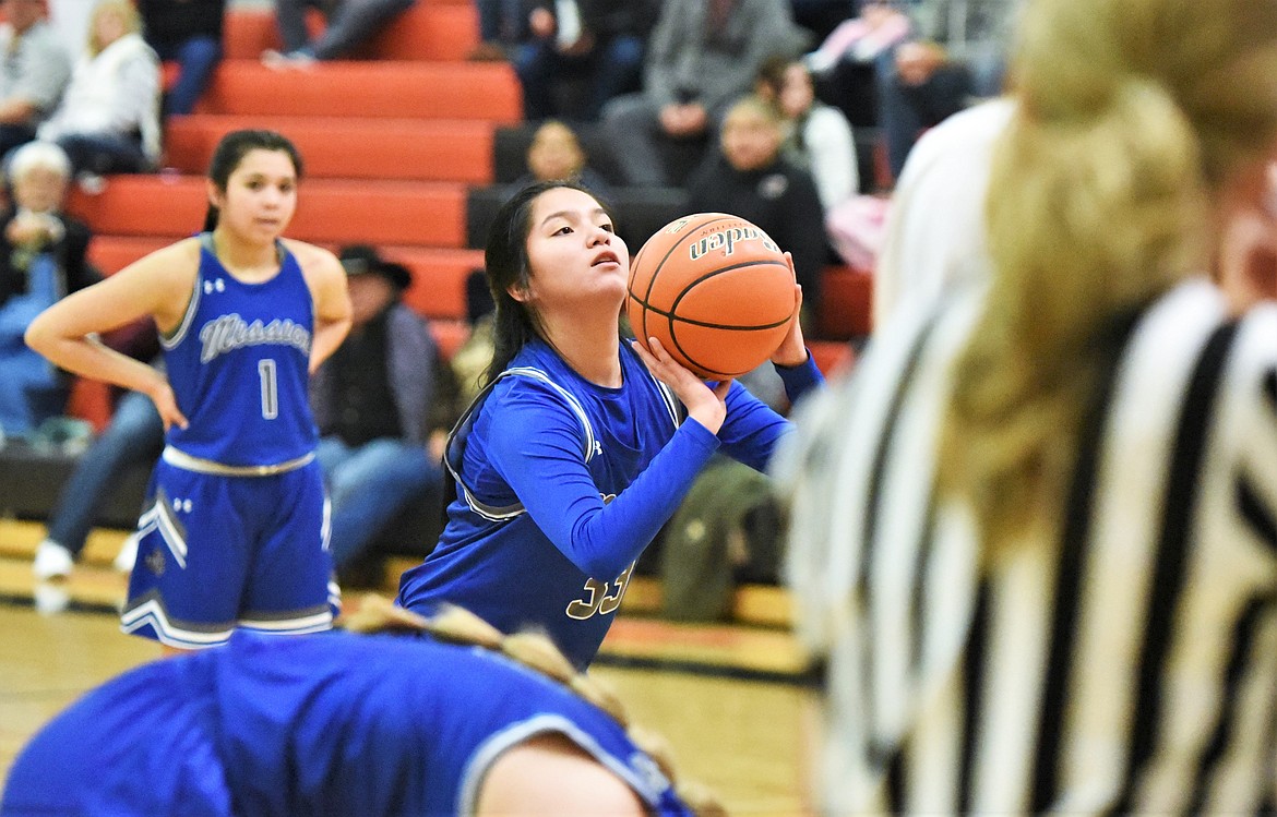 Mission's Olivia Adams shoots a free throw against Powell County on Friday. (Scot Heisel/Lake County Leader)