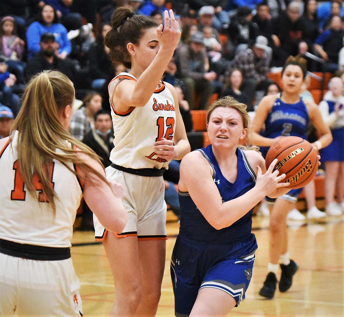 Mission's Gabby Smith looks for some space under the basket against Eureka on Saturday. (Scot Heisel/Lake County Leader)