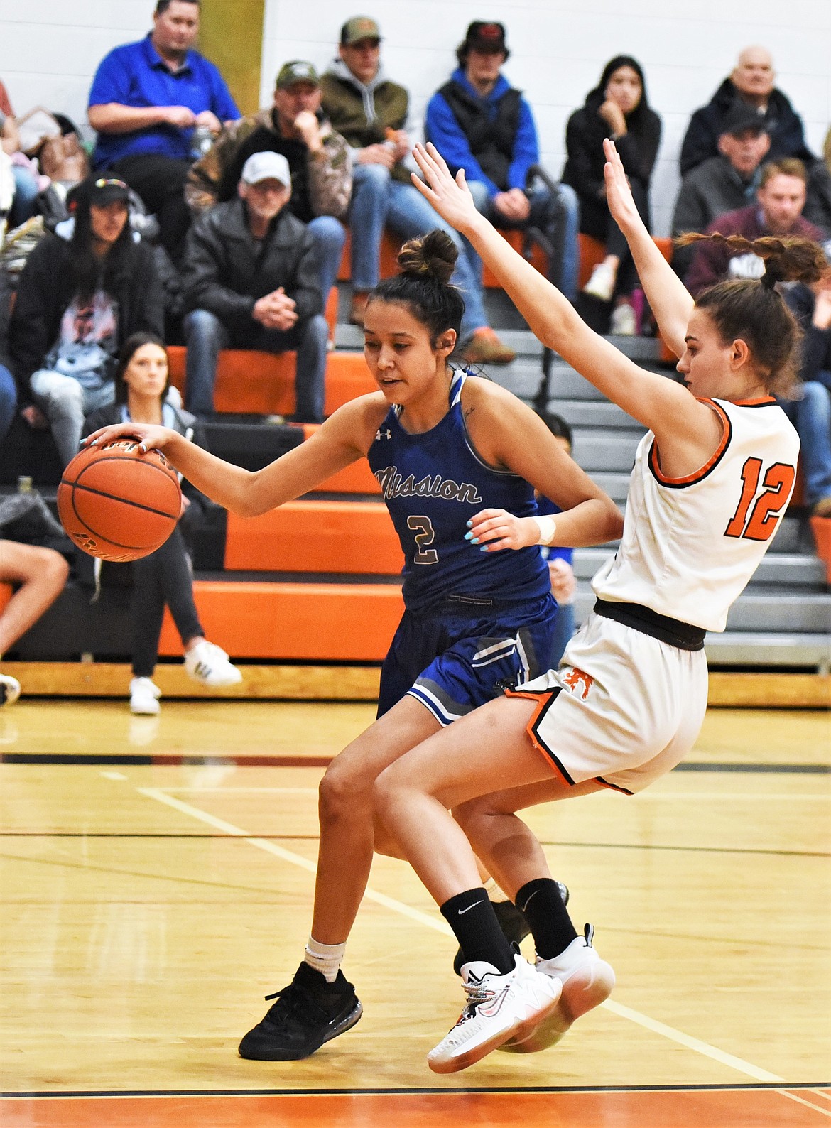 Mission's Kooper Page drives the baseline against Eureka on Saturday. (Scot Heisel/Lake County Leader)