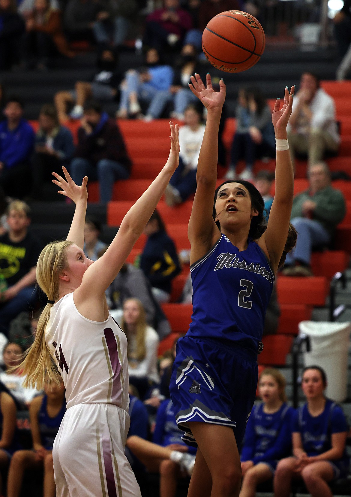 Mission's Kooper Page pulls up for a shot over Florence-Carlton during a 2022 home game. (Jeremy Weber/Daily Inter Lake)