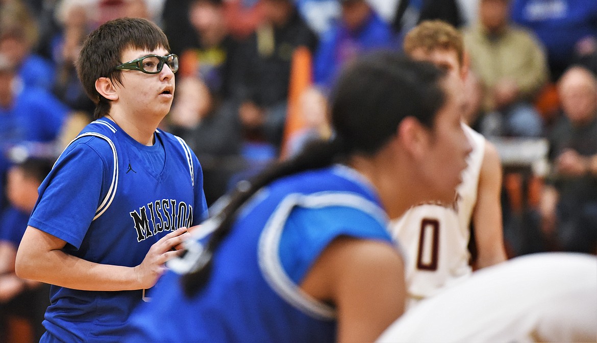 Mission's Michael Wheeler shoots a free throw against Florence-Carlton on Saturday. (Scot Heisel/Lake County Leader)