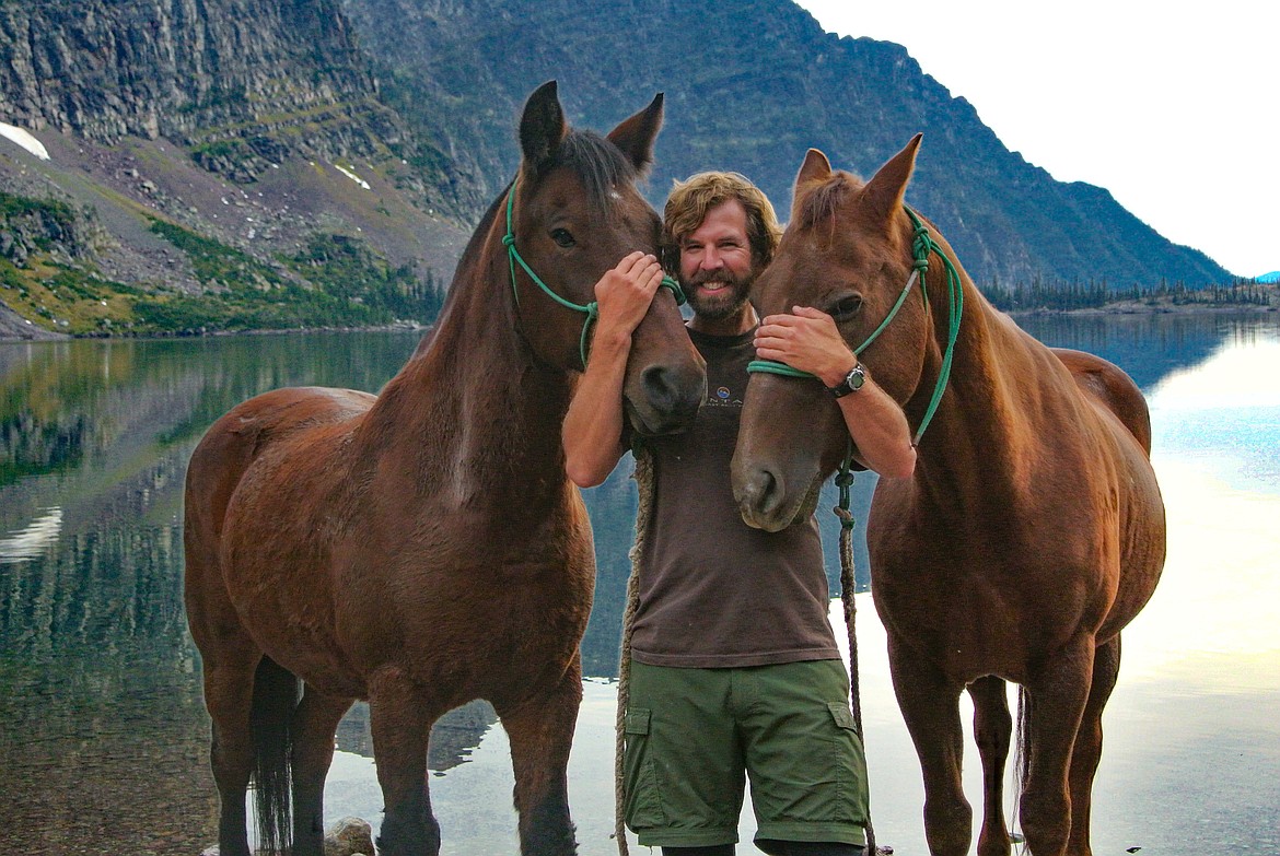 Nashville recording artist and Glacier National Park ranger Michael Shaw with his constant backcountry companions Pancho and Snuffy - photo credit Maggie Harrison