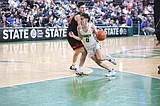 Jacks win first state game