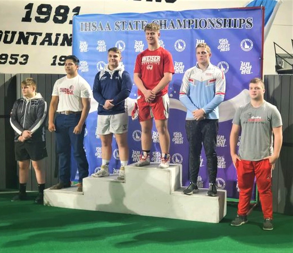 Jackson Rickter (third from left) placed second at state for the 220 weight class.