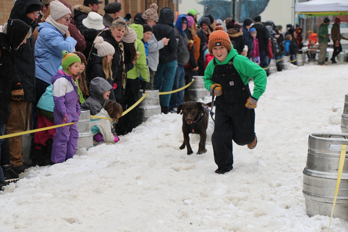 A competitor takes part in Sunday's K9 Keg Pull, a fan favorite at the Sandpoint Winter Carnival.