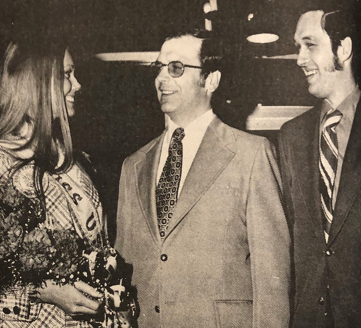 Miss USA Michele McDonald with J.C. Penney manager Dan Unger, center, and local Jaycees representative and later mayor, Al Hassell (March 1972).