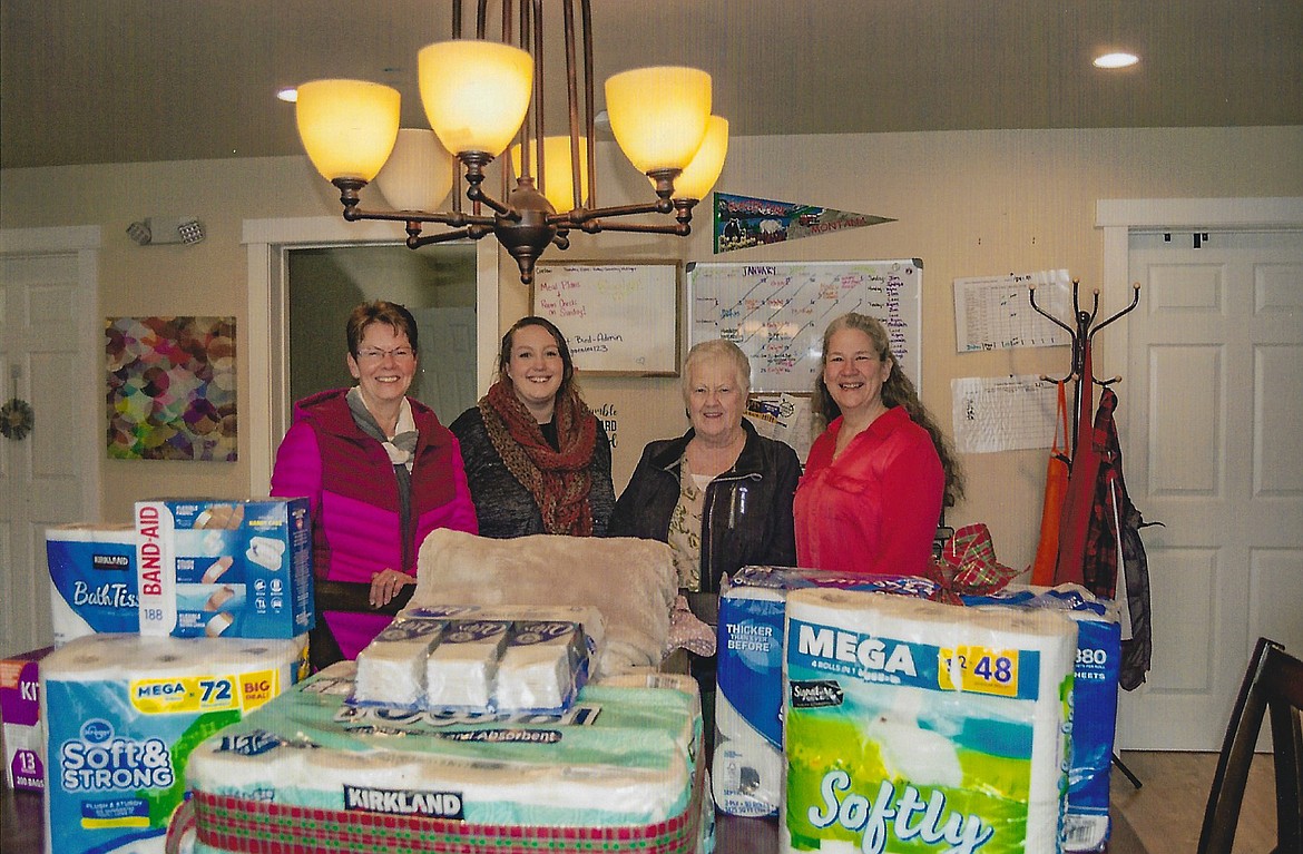 Pictured left to right are Debbie Sapp, financial chairperson of Chapter C, P.E.O., Kalispell; Rachelle Buckley, executive director of the Sparrow's Nest; and Lynda Kenfield and Laura Westcott, members of Chapter C’s Financial Committee.