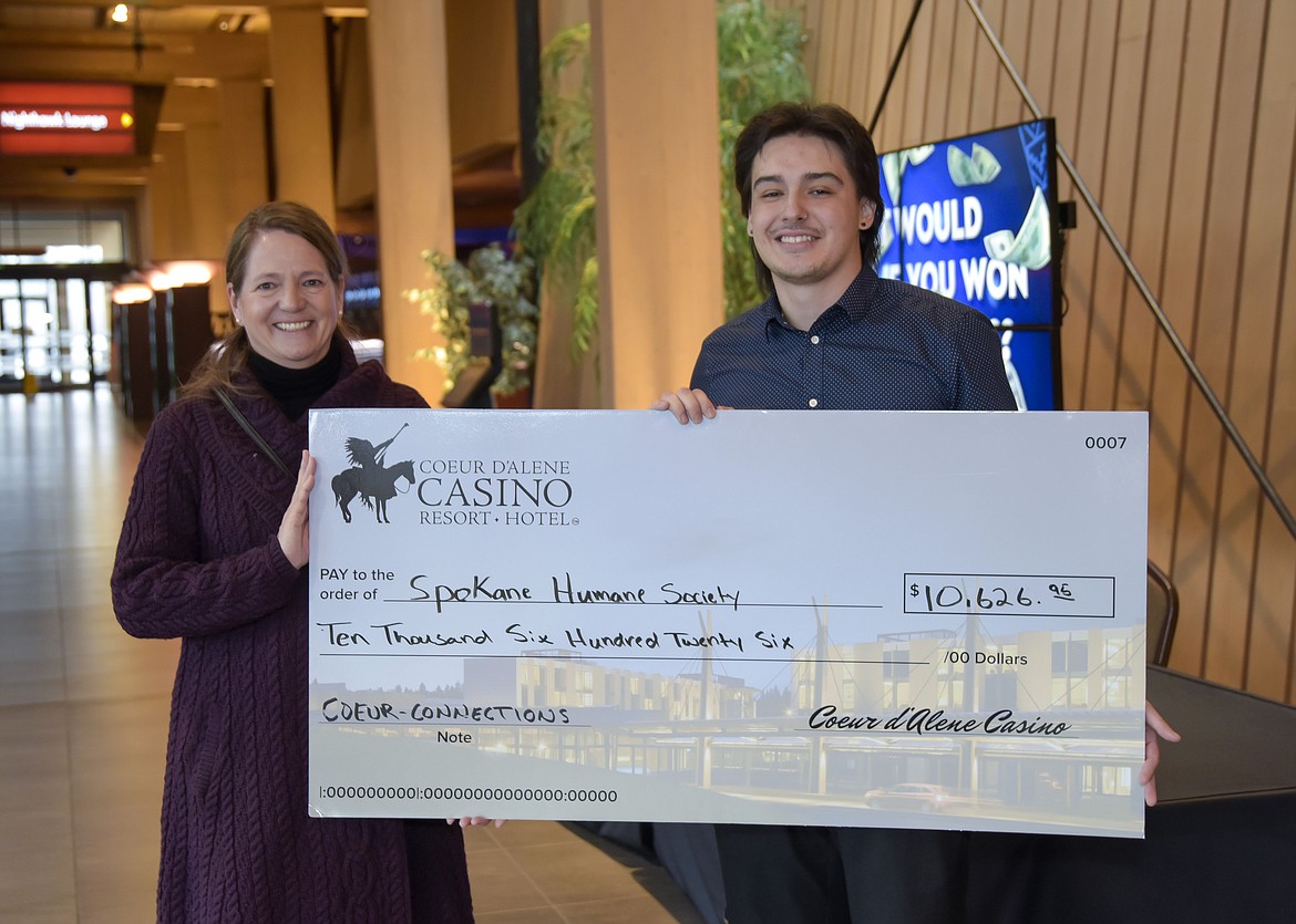 The Spokane Humane Society was presented with a check for $10,262. The donation was made by Coeur d'Alene Casino as part of its donation box initiative. A news release is below and in the press room. Kim Reasor, executive director of the Spokane Humane Society, poses with Tucker Louie-McGee of the Coeur d'Alene Casino.