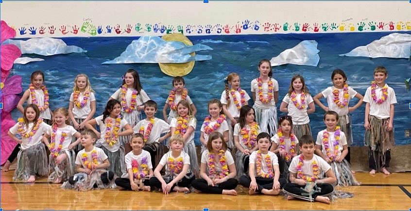 Students at Canyon Elementary posing for a photo after performing a unique hula dance.