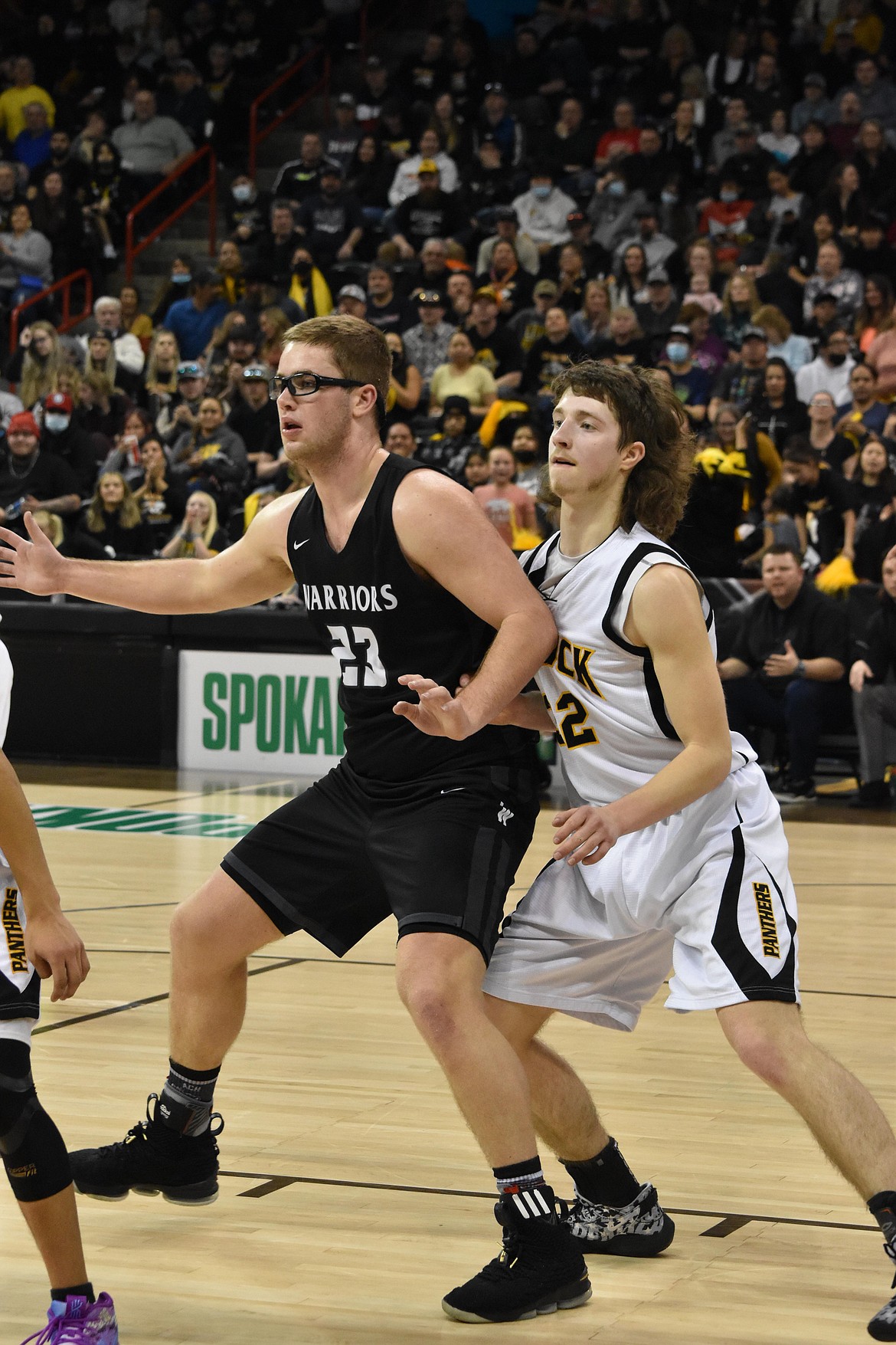 ACH senior Reece Isaak (23) fights to stay open during the championship matchup against Cusick on March 5.