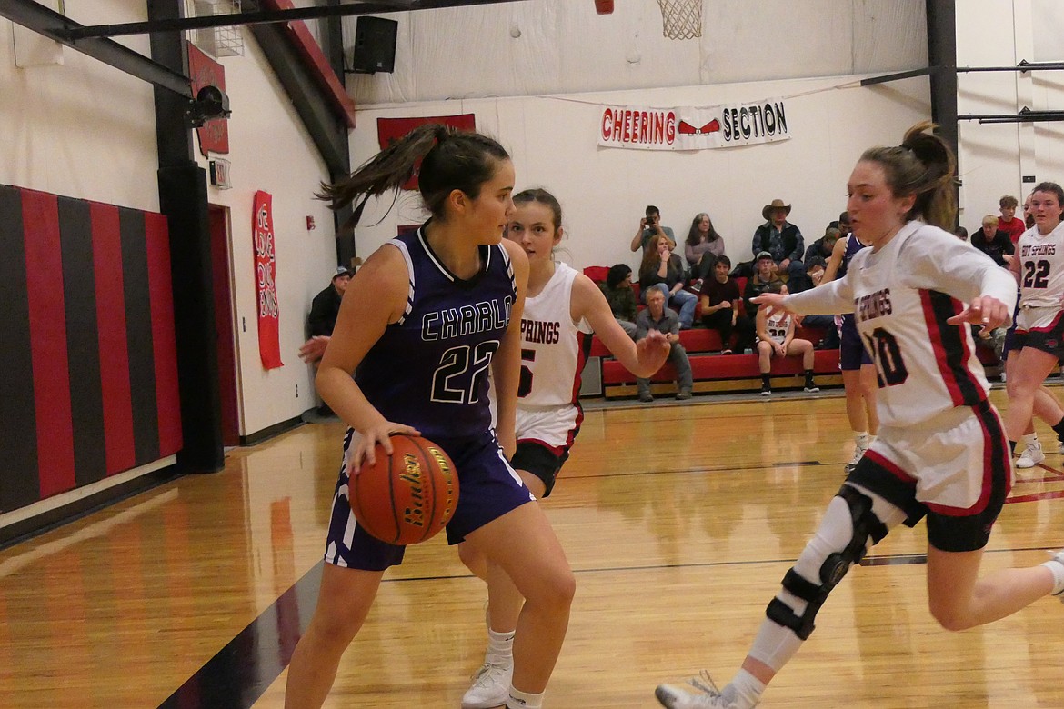 All-state and all-conference players Mila Hawk (purple) of Charlo and Hot Springs standout Katelyn Christensen confront each other on the basketball court during the 2021-22 girls basketball season.  (Chuck Bandel/VP-MI)