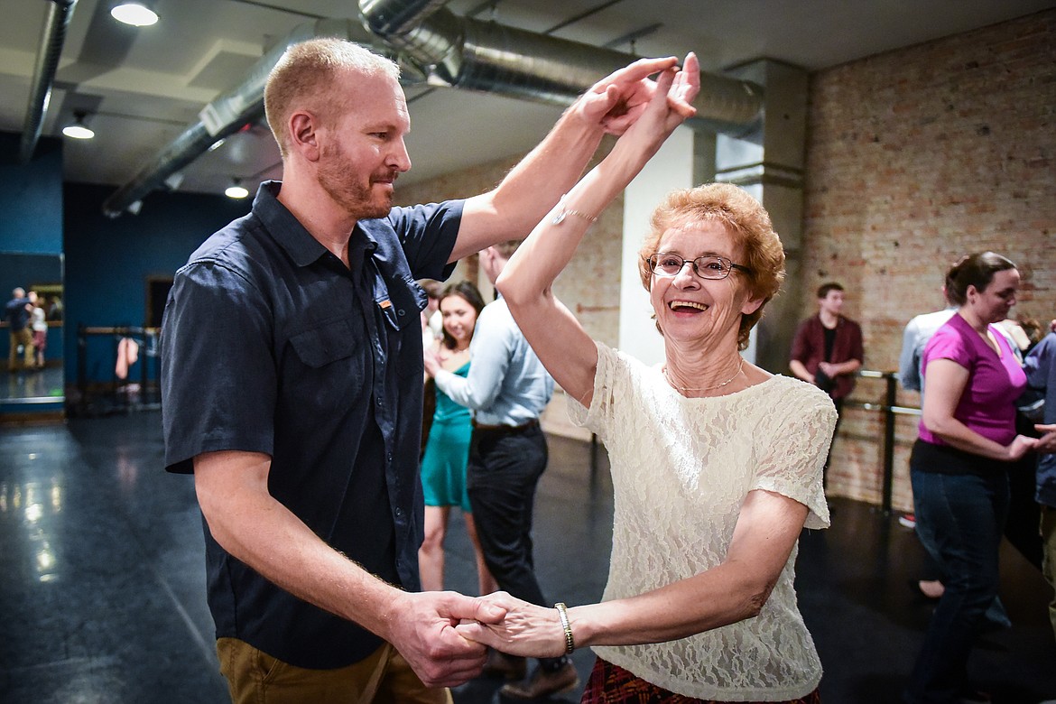 Participants practice East Coast Swing during a social dance and beginner lesson held by North End Swing at Noble Dance in Kalispell on Friday, March 4. (Casey Kreider/Daily Inter Lake)