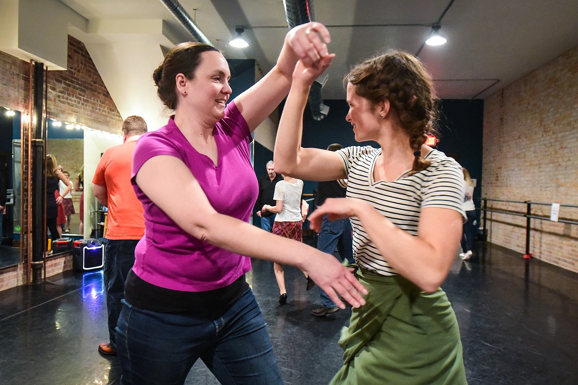 "AK" and Hana Head dance the Lindy Hop during a social dance and beginner lesson held by North End Swing at Noble Dance in Kalispell on Friday, March 4. (Casey Kreider/Daily Inter Lake)