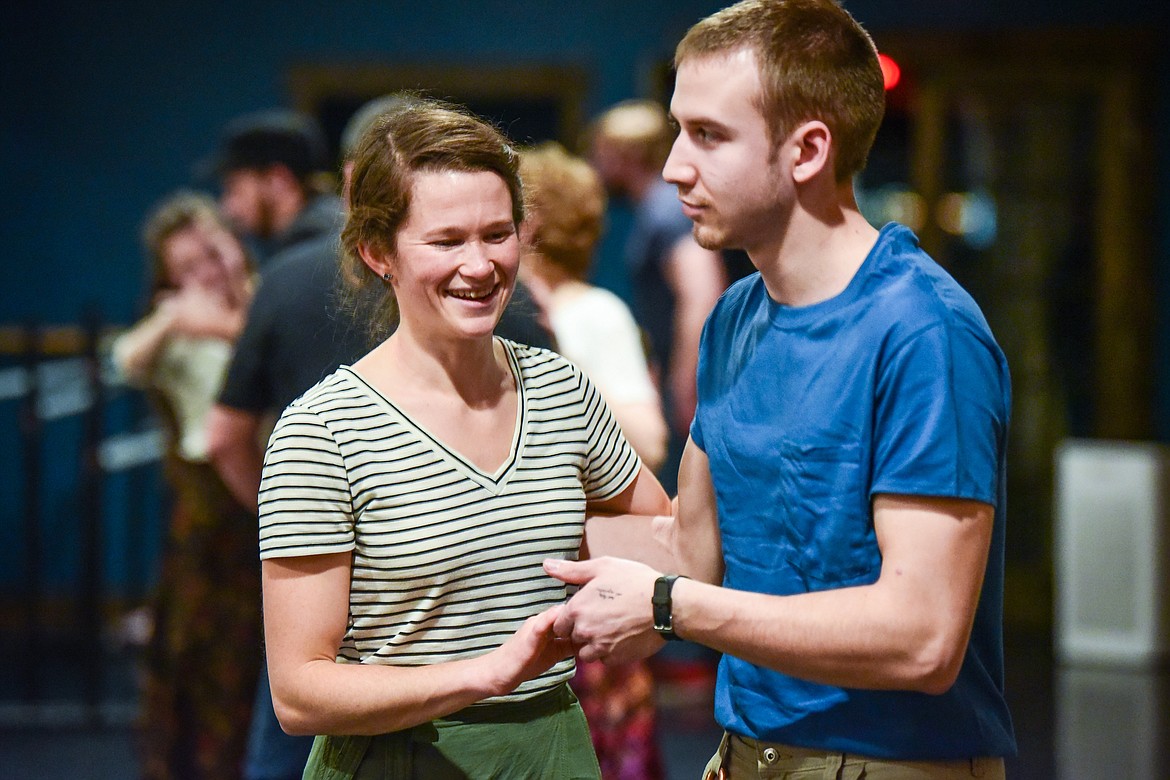 Hana Head goes over a few steps with a participant during a social dance and beginner lesson held by North End Swing at Noble Dance in Kalispell on Friday, March 4. (Casey Kreider/Daily Inter Lake)