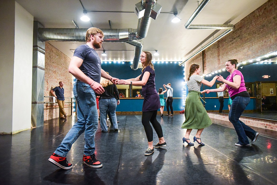 Participants dance during a social dance and beginner lesson held by North End Swing at Noble Dance in Kalispell on Friday, March 4. (Casey Kreider/Daily Inter Lake)