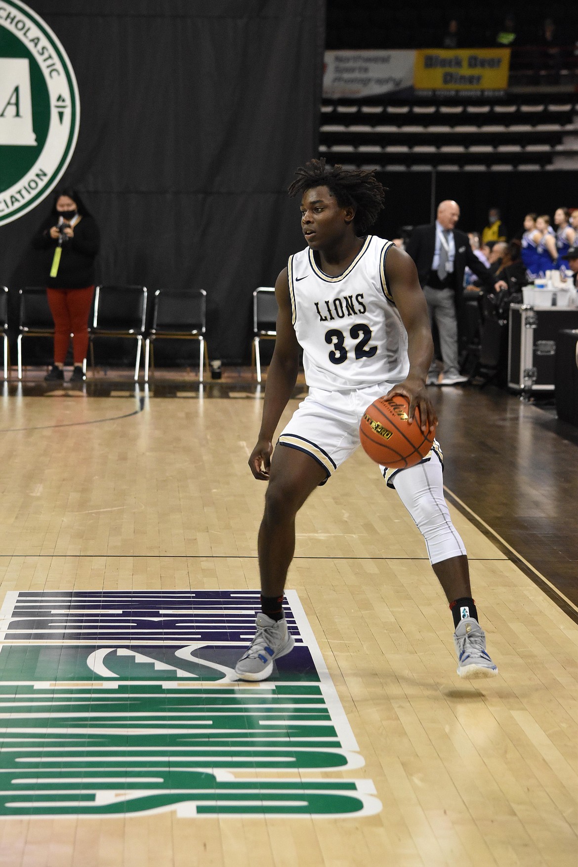 MLCA/CCS senior Pierre Boorman (32) brings the ball down the court in the matchup against Lummi Nation on March 5.