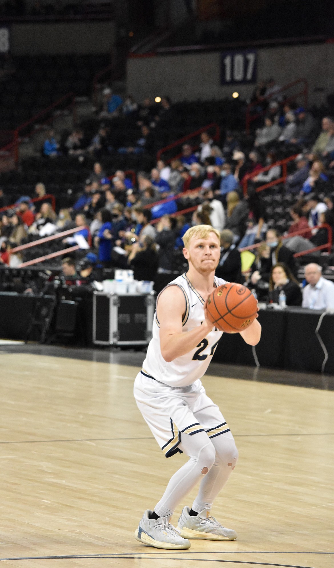 MLCA/CCS senior Jacob Robertson (24) attempts a three-point shot at the March 5 state tournament game against Lummi Nation.