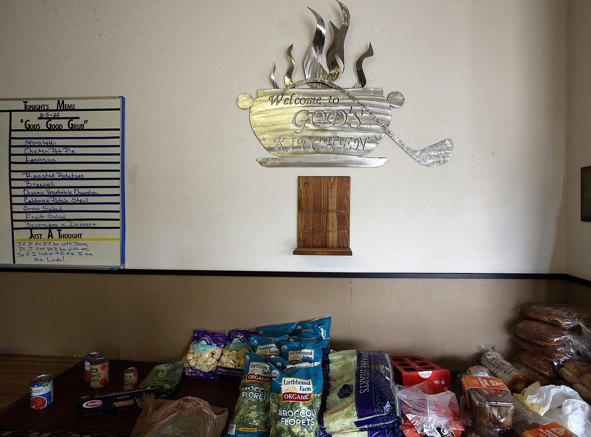 Free food sits on a table at Cherished Ones Ministries on Tuesday.