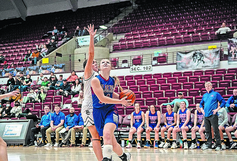 Columbia Falls’ Hope McAtee drives towards the basket against Billings Central on Wednesday at the State A basketball tournament. (JP Edge/Hungry Horse News)