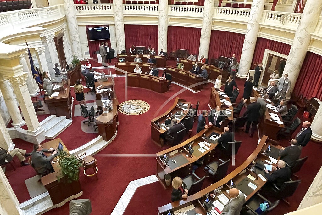 In this Friday, Jan. 15, 2021, file photo, the Idaho Senate gathers in the Statehouse in Boise, Idaho. A bill that would have increased the secrecy surrounding Idaho's execution drug suppliers died in a Senate committee hearing Wednesday, March 9, 2022, on a tie vote. The legislation would have barred Idaho officials from releasing where they obtain the drugs used in lethal injections. (AP Photo/Keith Ridler, File)