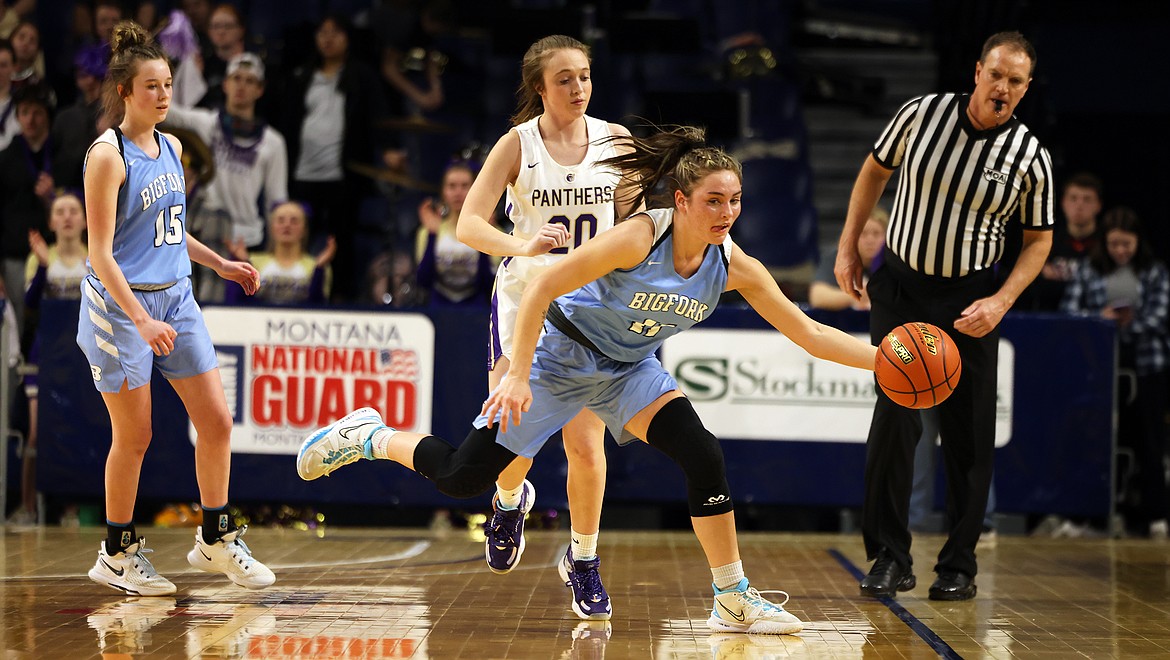 Bigfork's Emma Berreth steals a pass intended for Jefferson's MacKenzie Layng during the third quarter of opening-round action at the State B Basketball Tournament in Bozeman Thursday. (Jeremy Weber/Bigfork Eagle)