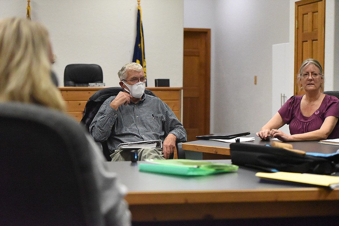 Health board members Jim Seifert and Debra Armstrong debate bylaws at an October 2021 work meeting. (Derrick Perkins/The Western News)